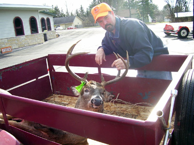 Deer Hunter and Trophy Buck
